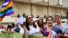 Mariela Castro (izq.) y Lis Cuesta encabezaron la conga oficialista contra la homofobia y la transfobia este sábado en La Habana. (YAMIL LAGE/AFP)