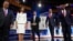 Aspirantes a la candidatura republicana a la presidencia en debate en Miami, (izq. a der.) Chris Christie, Nikki Haley, Ron DeSantis, Vivek Ramaswamy y Tim Scott.