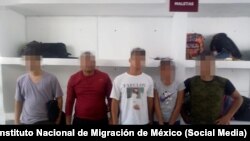 Migrantes capturados por la Guardia Nacional de México