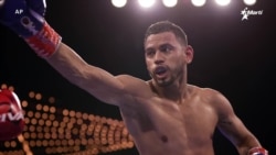 Púgil cubano victorioso en el Madison Square Garden.  Púgil cubano victorioso en el Madison Square Garden.