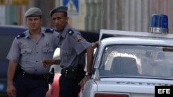 Hundreds of people flock to El Rincón, a shrine dedicated to Saint Lazarus, on the outskirts of Havana.