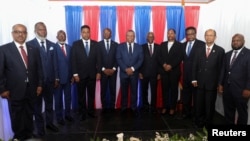 Louis Gerald Gilles, Frinel Joseph, Emmanuel Vertilaire, Laurent Saint-Cyr, Michel Patrick Boisvert, Jean Joseph Lebrun, Edgard Leblanc Fils, Regine Abraham, Fritz Alphonse Jean, Leslie Voltaire y Smith Augustin integran el Consejo de Transición de Haití, el 25 de abril de 2024.
