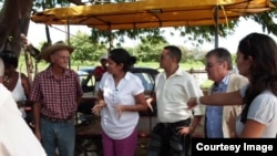 Representantes de la ONG Oikos en Cuba