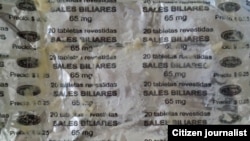 Reporta Cuba. Alternativas ante la escasez: Usan papel de envolver medicamentos para los envases de mantequilla casera. Foto: Bárbara Fernández.