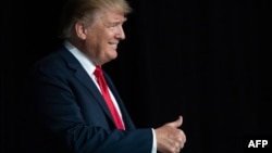 El presidente Donald Trump durante una reunión de la Asociación Nacional del Rifle, este 26 de abril.