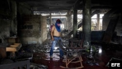 Siete miembros de una familia, entre ellos tres niños, murieron calcinados cuando su vivienda fue incendiada