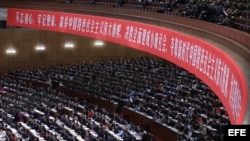 Los delegados participan en la ceremonia inaugural del XIX Congreso Nacional del Partido Comunista de China en el Gran Palacio del Pueblo en Pekín.
